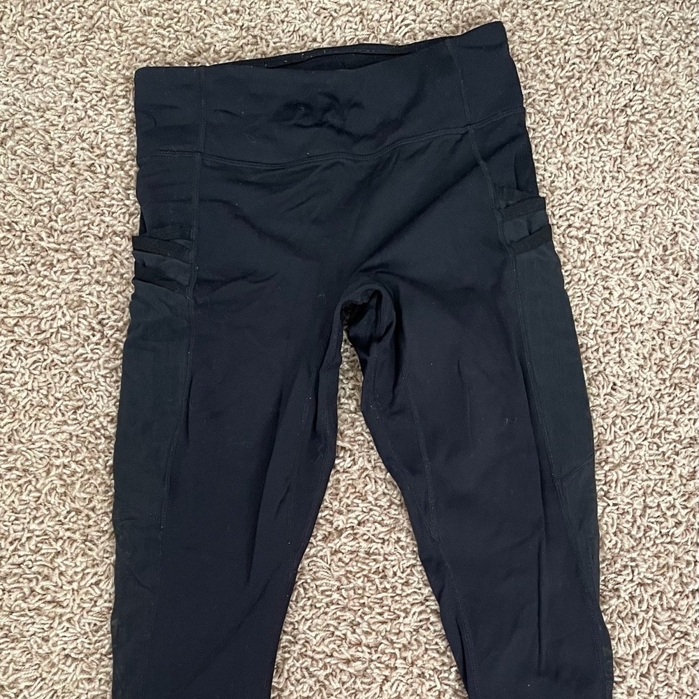 Black Fabletics leggings with mesh side pockets